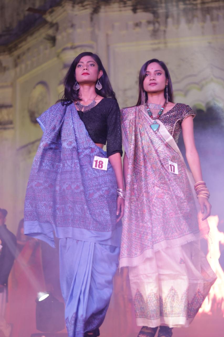 Female model in traditional attire walking the ramp at Mega Model Hunt
